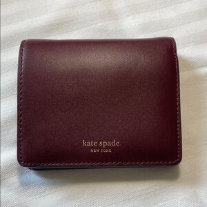 Kate Spade Nadine small bifold wallet in cherrywood